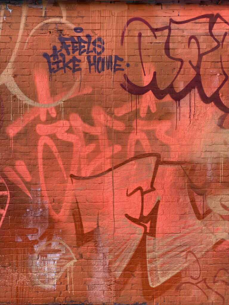 Close-up of graffiti mural created by With Jeej in various orange shades for the official video of the F1 Dutch Grand Prix anthem.